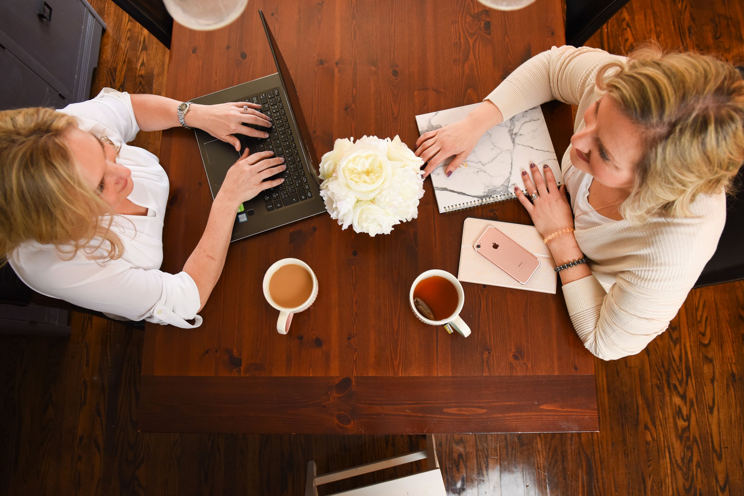 Overhead view of a business meeting over coffee in Milton