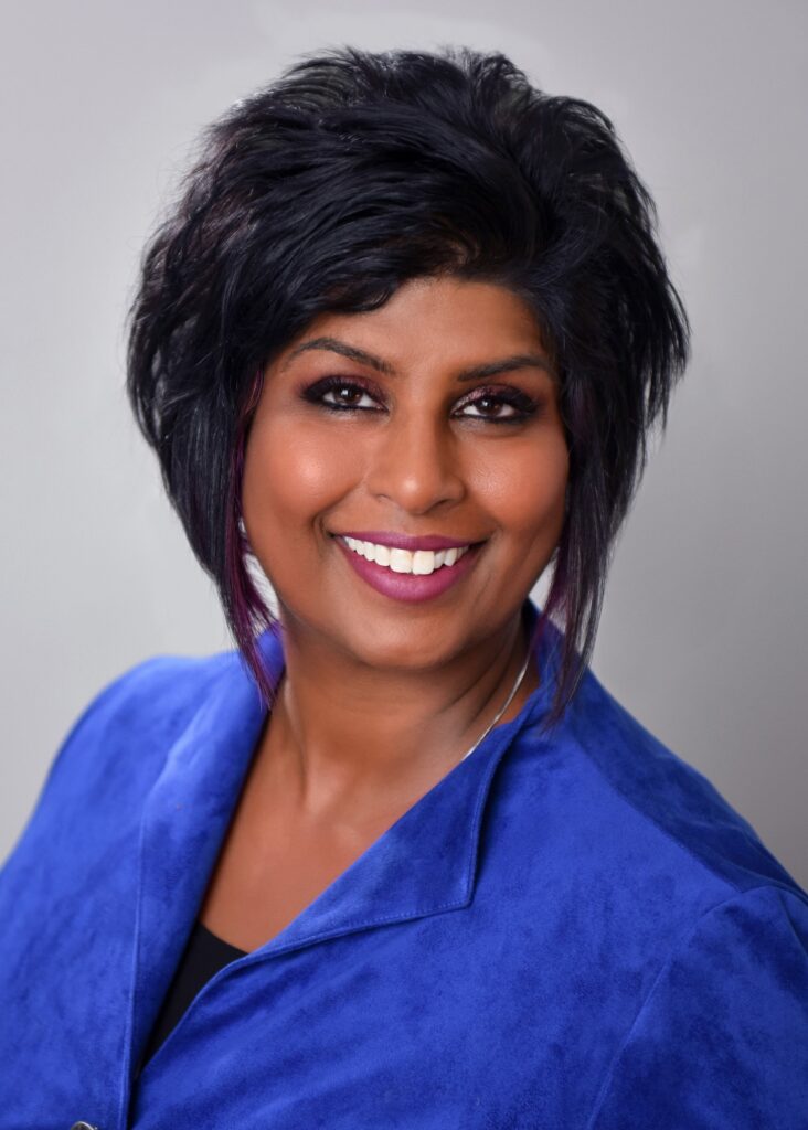 An executive posing for a professional headshot in Toronto, showcasing corporate portrait photography aimed at capturing leadership and professionalism