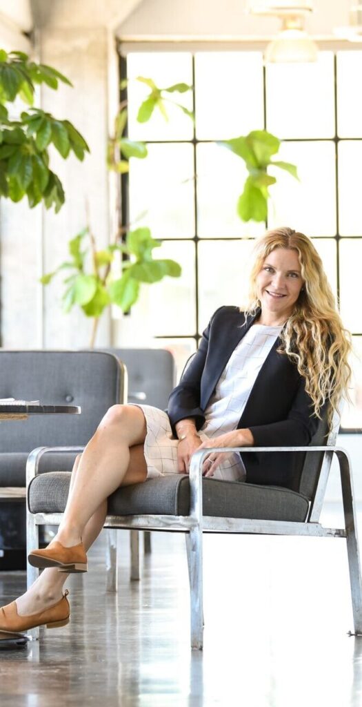 Businesswoman sitting in a modern office in Milton, Ontario

